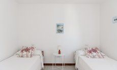 Casa Su Faru 3 | Schlafzimmer 2 mit zwei Einzelbetten Schlafzimmer mit zwei Einzelbetten von Su Faru 3 Pula