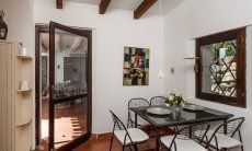 Casa 1 | Von der Küche auf den Patio Hausdarstellung Casa 1 Sant Elmo Südsardinien