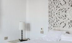 Casa 1 | Geräumiges Schlafzimmer mit Doppelbett Hausdarstellung Casa 1 Sant Elmo Südsardinien
