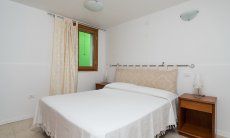 Villa del Campo | Schlafzimmer 3 im UG mit Doppelbett Villa del Campo, Is Molas, Pula