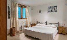 Villa del Campo | Schlafzimmer 4 im UG mit Doppelbett Villa del Campo, Is Molas, Pula