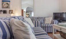Villa Maestrale | Sofa und Fernseher Villa Maestrale, Cala Ginepro, Olbia