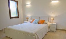 Villetta Fabio | Schlafzimmer mit Doppelbett Villetta Fabio, Costa Rei