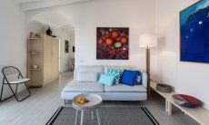 Casa 1 | Vom Wohnzimmer führt ein offener Gang in die Küche Wohnraum Casa 1 Sant'Elmo
