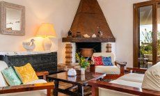 Villa Palme | Sitzecke im Wohnraum direkt am Kamin New Picture