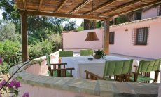 Villa Fiori 4 | Runder, überdachter Essbereich auf der Terrasse Sardinien
